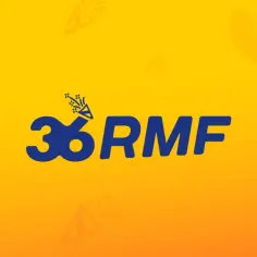 Logo RMF FM z konfetti na żółtym tle.